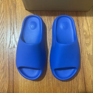 Brand new blue Yeezy Slides. Price negotiable